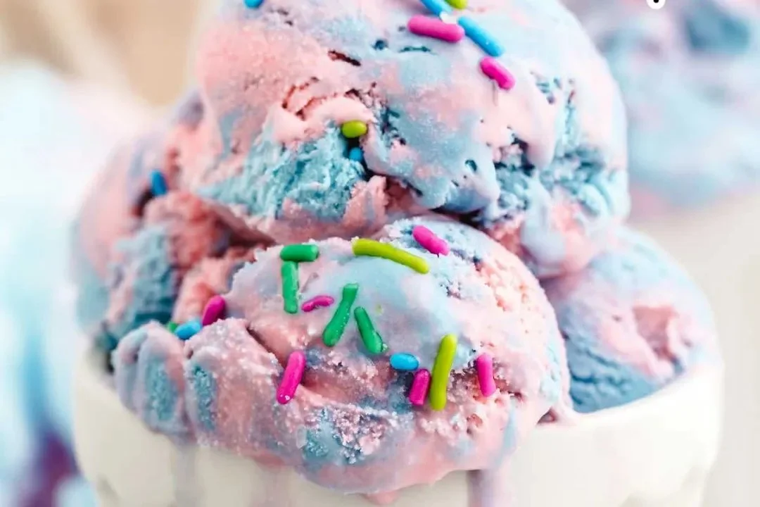 Delicious bowl of cotton candy ice cream topped with sprinkles