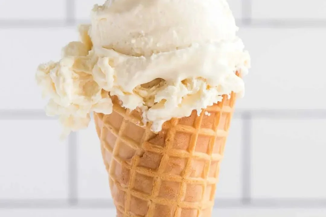 Delicious no-churn vanilla ice cream served in a bowl with sprinkles.