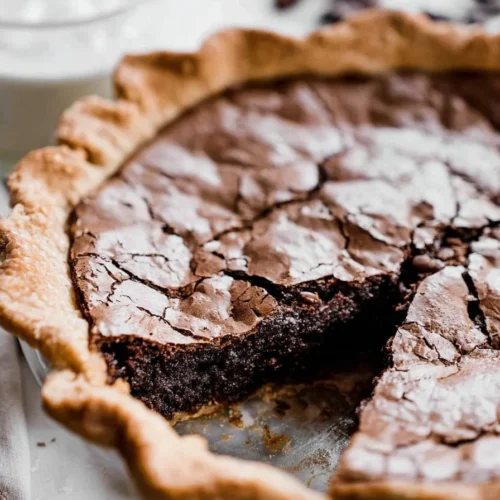 Delicious Brownie Pie served on a plate with a fork